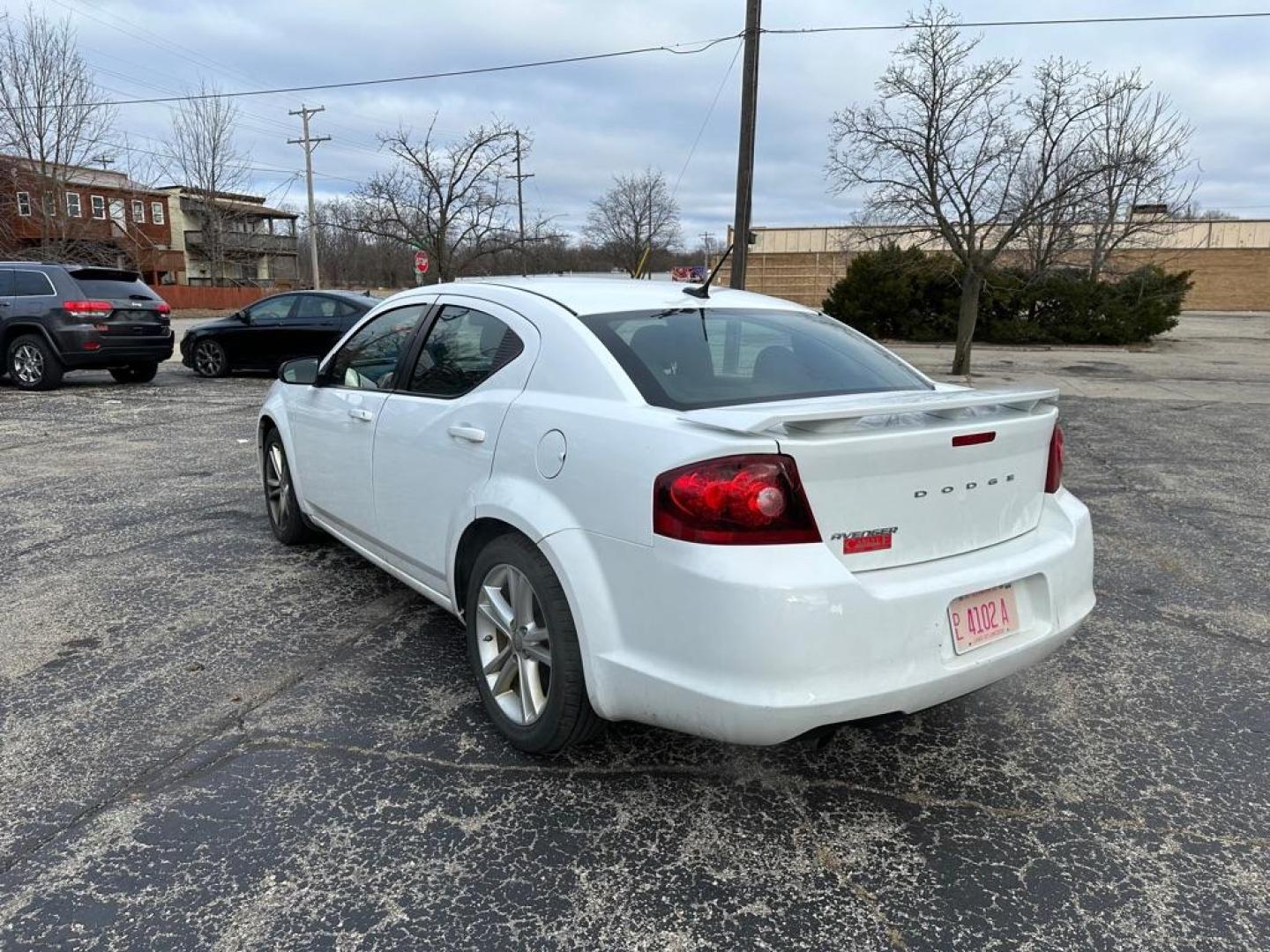 2013 WHITE DODGE AVENGER SE (1C3CDZAG0DN) with an 3.6L engine, Automatic transmission, located at 1708 Broadway, Rockford, IL, 61104, (815) 397-5010, 42.252522, -89.069359 - Photo#3