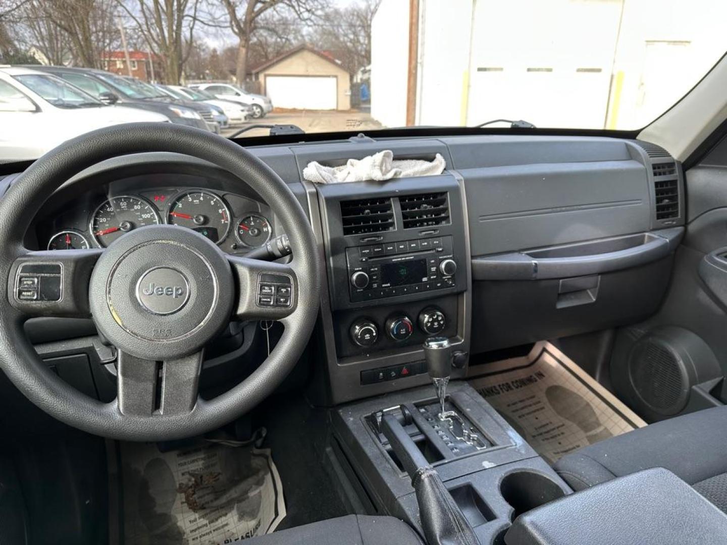 2012 SILVER JEEP LIBERTY SPORT (1C4PJMAK0CW) with an 3.7L engine, Automatic transmission, located at 1708 Broadway, Rockford, IL, 61104, (815) 397-5010, 42.252522, -89.069359 - Photo#6