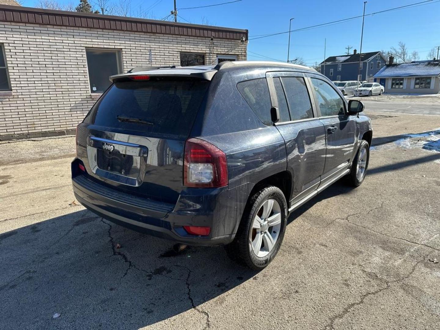 2016 BLUE JEEP COMPASS SPORT (1C4NJCBA6GD) with an 2.0L engine, Continuously Variable transmission, located at 1708 Broadway, Rockford, IL, 61104, (815) 397-5010, 42.252522, -89.069359 - Photo#2