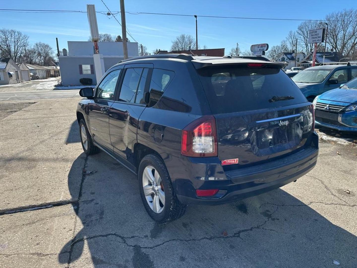 2016 BLUE JEEP COMPASS SPORT (1C4NJCBA6GD) with an 2.0L engine, Continuously Variable transmission, located at 1708 Broadway, Rockford, IL, 61104, (815) 397-5010, 42.252522, -89.069359 - Photo#3