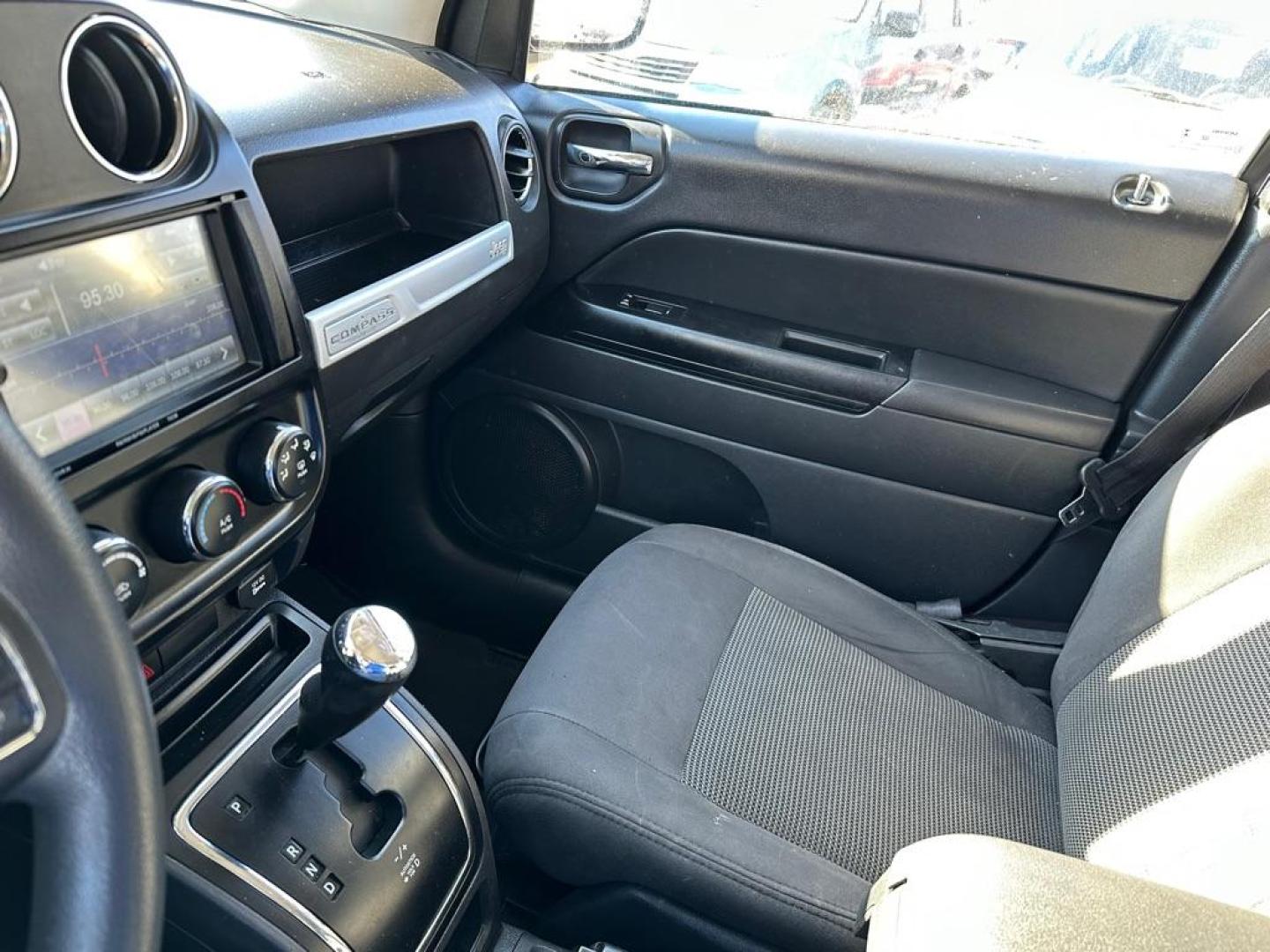 2016 BLUE JEEP COMPASS SPORT (1C4NJCBA6GD) with an 2.0L engine, Continuously Variable transmission, located at 1708 Broadway, Rockford, IL, 61104, (815) 397-5010, 42.252522, -89.069359 - Photo#8