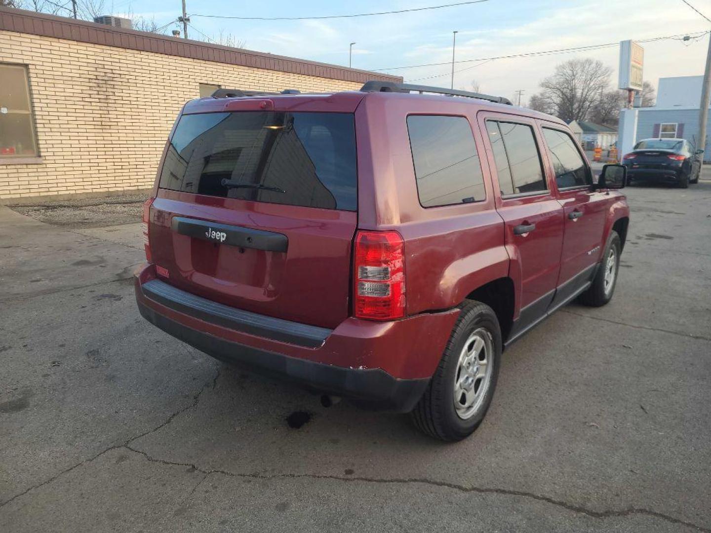 2017 RED JEEP PATRIOT SPORT (1C4NJPBA8HD) with an 2.0L engine, Continuously Variable transmission, located at 1708 Broadway, Rockford, IL, 61104, (815) 397-5010, 42.252522, -89.069359 - Photo#1