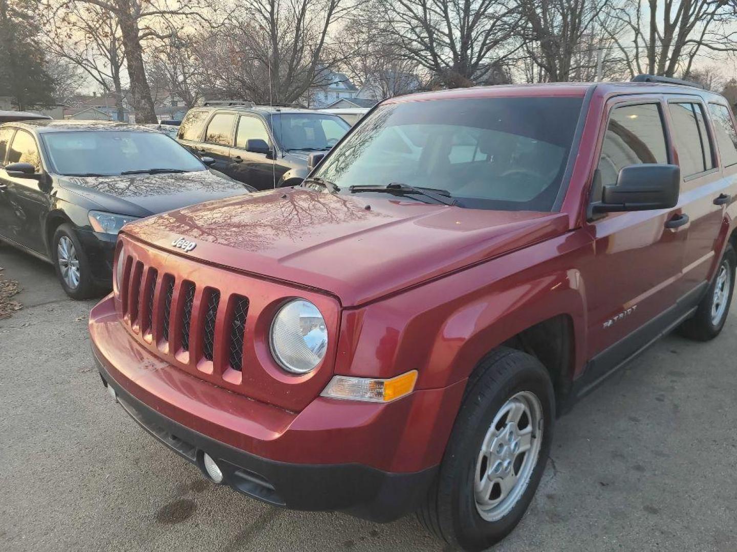 2017 RED JEEP PATRIOT SPORT (1C4NJPBA8HD) with an 2.0L engine, Continuously Variable transmission, located at 1708 Broadway, Rockford, IL, 61104, (815) 397-5010, 42.252522, -89.069359 - Photo#2