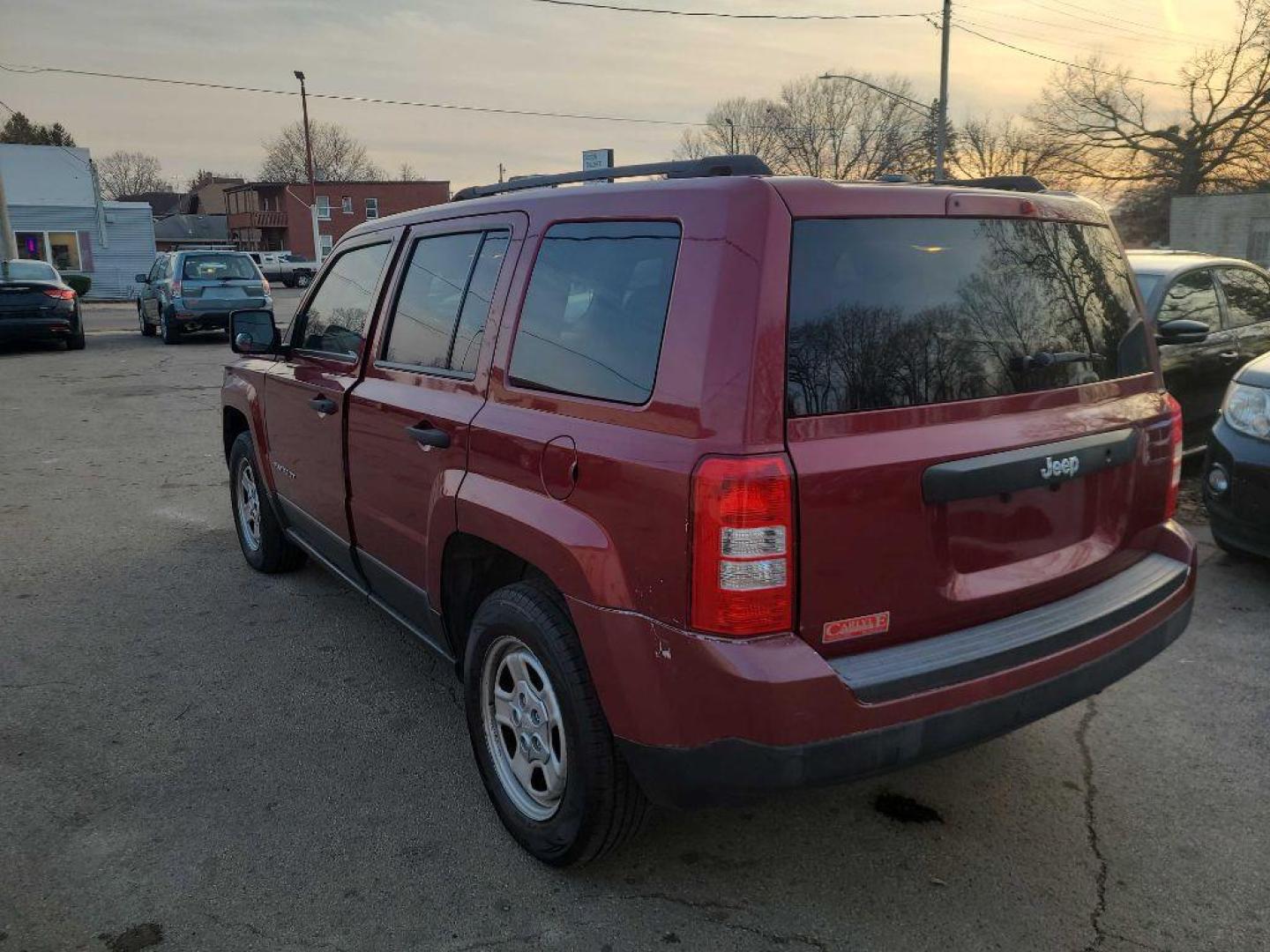 2017 RED JEEP PATRIOT SPORT (1C4NJPBA8HD) with an 2.0L engine, Continuously Variable transmission, located at 1708 Broadway, Rockford, IL, 61104, (815) 397-5010, 42.252522, -89.069359 - Photo#3