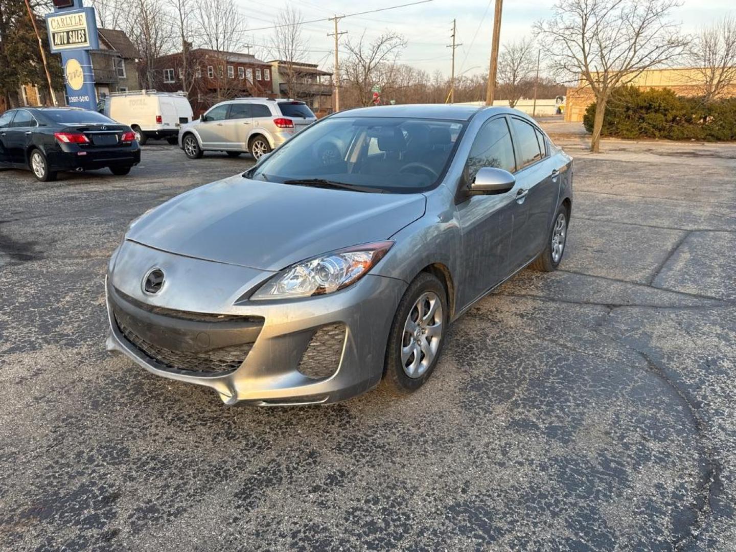 2012 SILVER MAZDA 3 I (JM1BL1UF1C1) with an 2.0L engine, Automatic transmission, located at 1708 Broadway, Rockford, IL, 61104, (815) 397-5010, 42.252522, -89.069359 - Photo#0