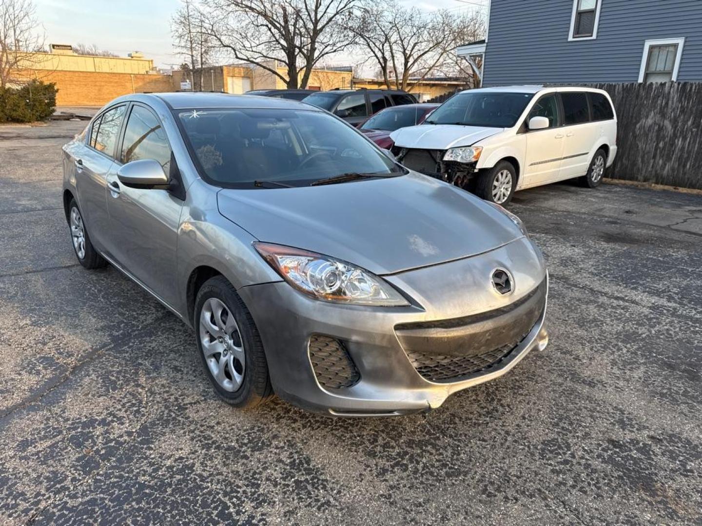 2012 SILVER MAZDA 3 I (JM1BL1UF1C1) with an 2.0L engine, Automatic transmission, located at 1708 Broadway, Rockford, IL, 61104, (815) 397-5010, 42.252522, -89.069359 - Photo#1