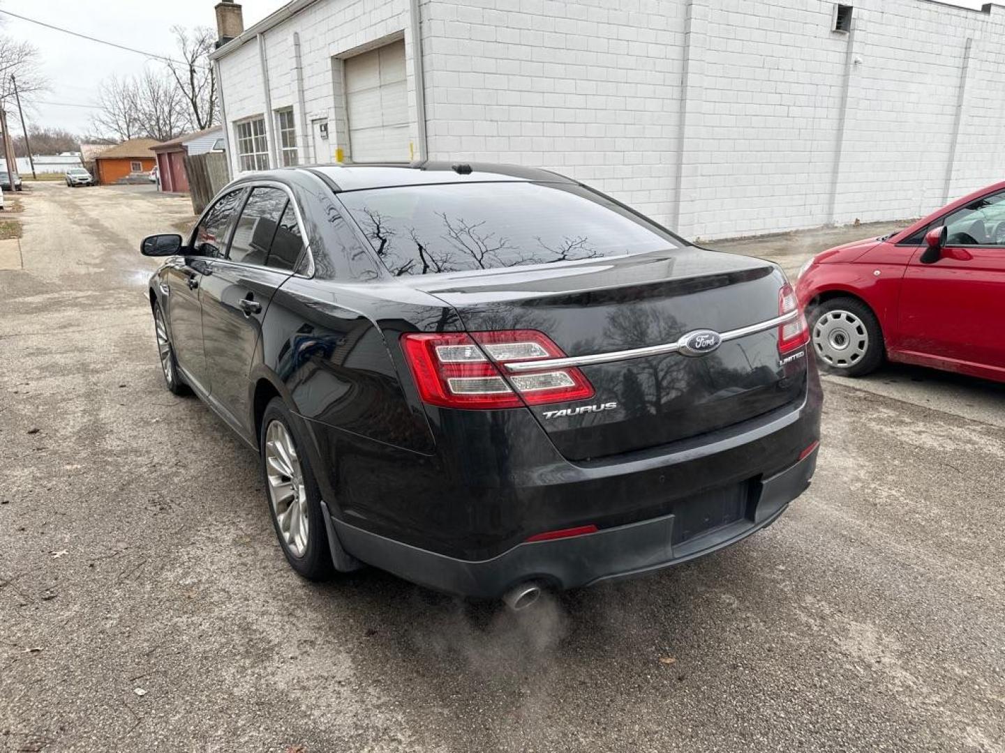 2013 BLACK FORD TAURUS LIMITED (1FAHP2F82DG) with an 3.5L engine, Automatic transmission, located at 1708 Broadway, Rockford, IL, 61104, (815) 397-5010, 42.252522, -89.069359 - Photo#1