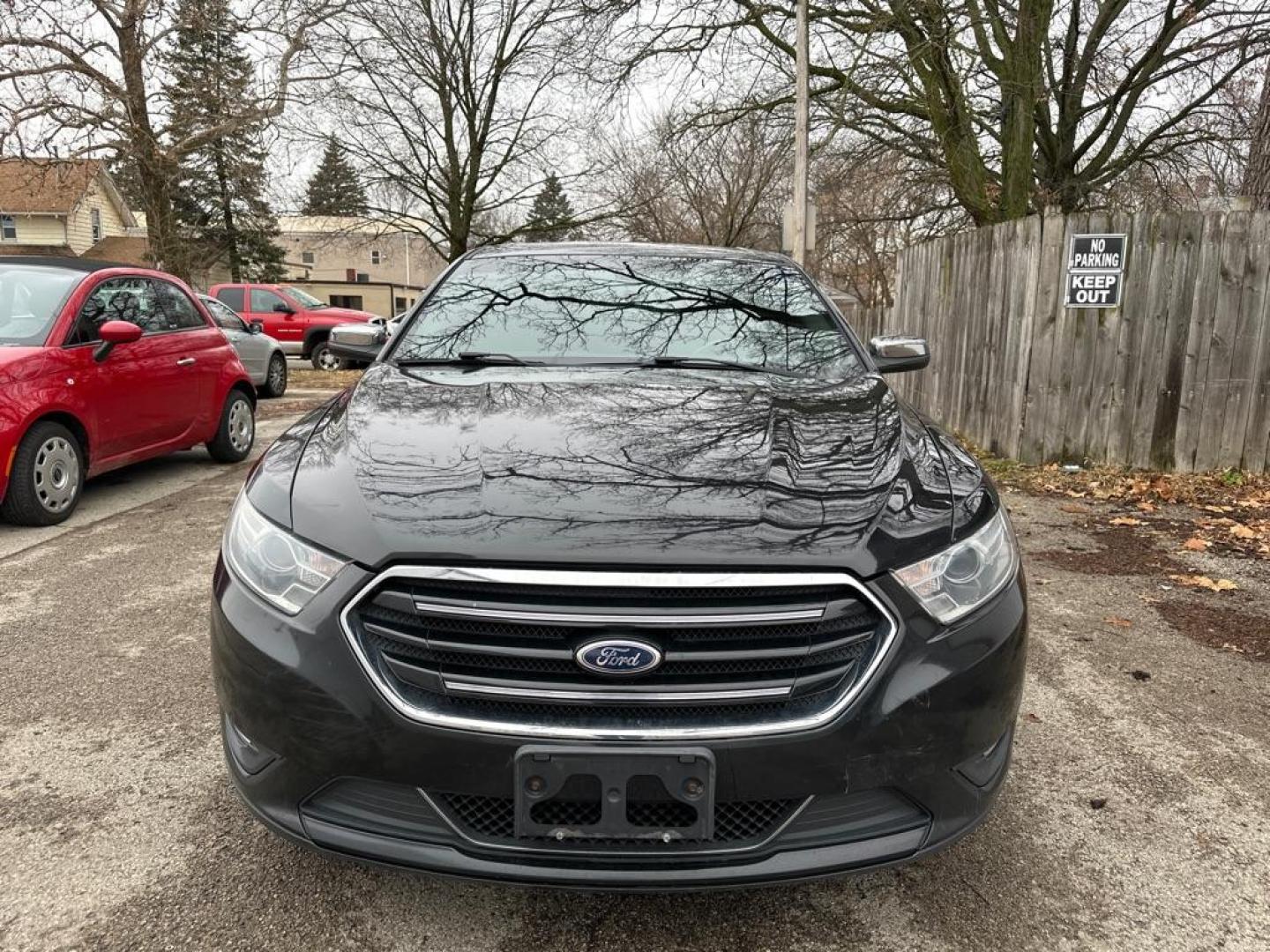 2013 BLACK FORD TAURUS LIMITED (1FAHP2F82DG) with an 3.5L engine, Automatic transmission, located at 1708 Broadway, Rockford, IL, 61104, (815) 397-5010, 42.252522, -89.069359 - Photo#4