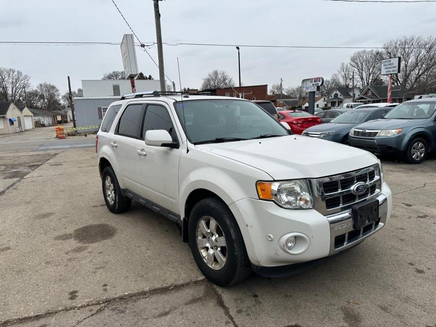 2012 WHITE FORD ESCAPE LIMITED (1FMCU9EG8CK) with an 3.0L engine, Automatic transmission, located at 1708 Broadway, Rockford, IL, 61104, (815) 397-5010, 42.252522, -89.069359 - Photo#1