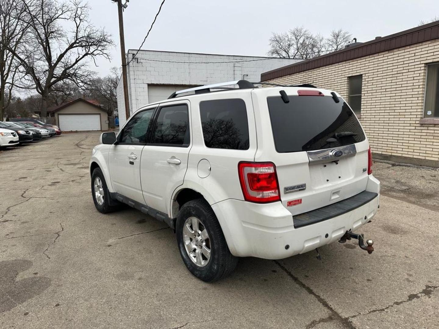 2012 WHITE FORD ESCAPE LIMITED (1FMCU9EG8CK) with an 3.0L engine, Automatic transmission, located at 1708 Broadway, Rockford, IL, 61104, (815) 397-5010, 42.252522, -89.069359 - Photo#3