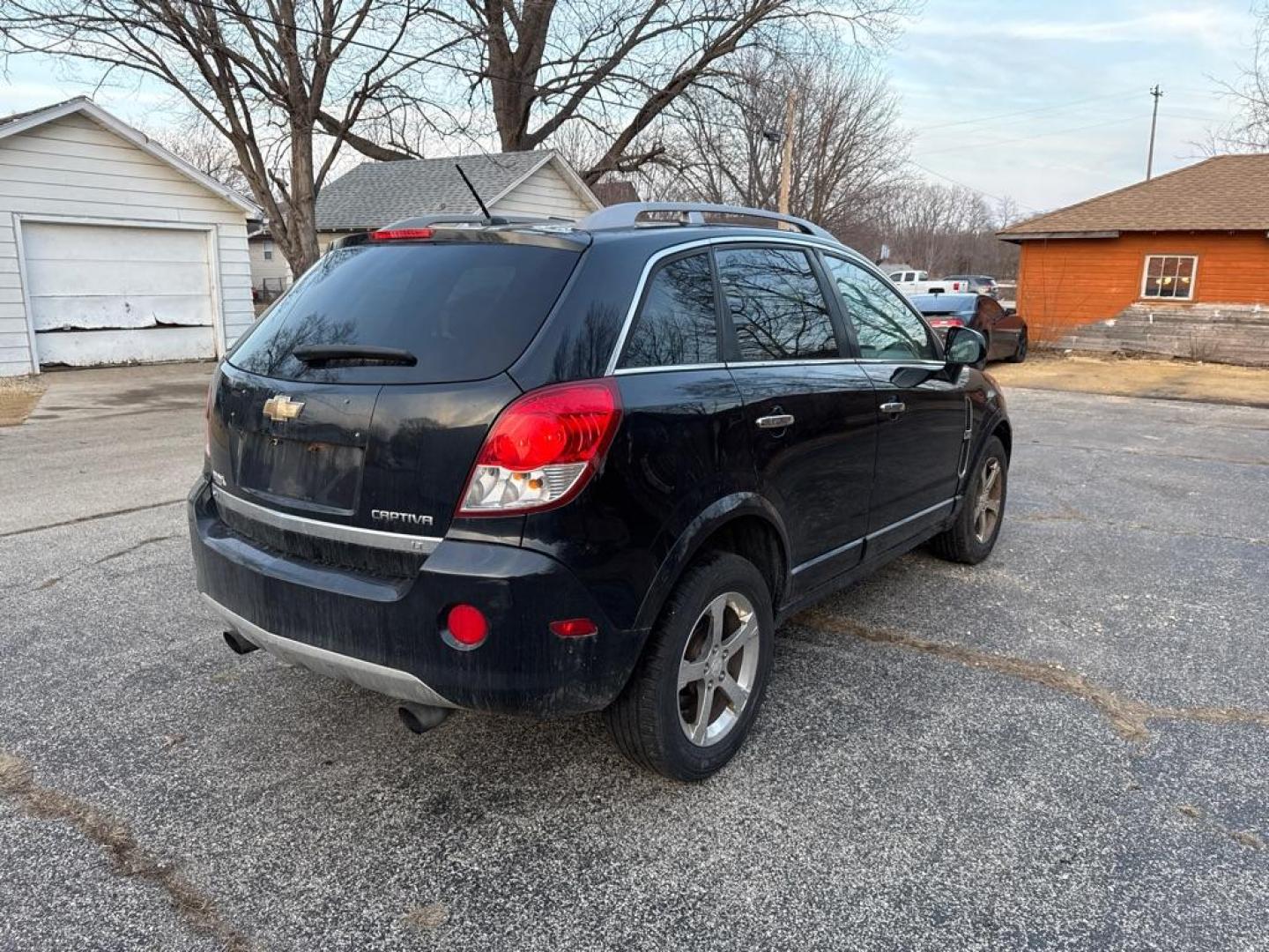 2012 BLUE CHEVROLET CAPTIVA SPORT (3GNAL3E55CS) with an 3.0L engine, Automatic transmission, located at 1708 Broadway, Rockford, IL, 61104, (815) 397-5010, 42.252522, -89.069359 - Photo#2