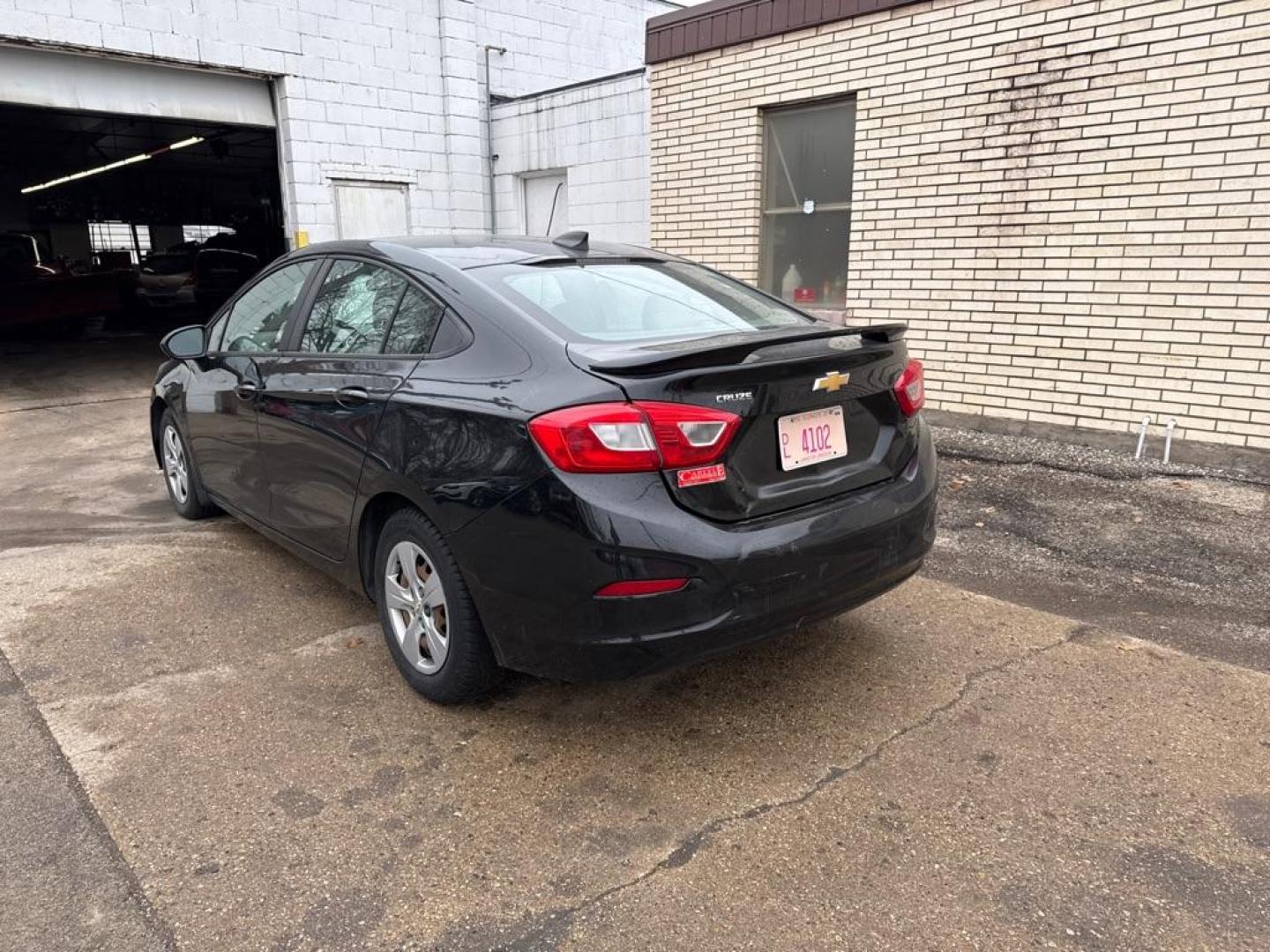 2017 BLACK CHEVROLET CRUZE LS (1G1BC5SM3H7) with an 1.4L engine, Automatic transmission, located at 1708 Broadway, Rockford, IL, 61104, (815) 397-5010, 42.252522, -89.069359 - Photo#2