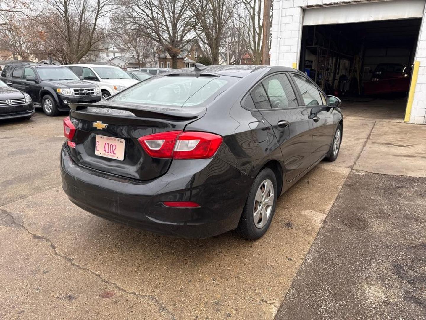 2017 BLACK CHEVROLET CRUZE LS (1G1BC5SM3H7) with an 1.4L engine, Automatic transmission, located at 1708 Broadway, Rockford, IL, 61104, (815) 397-5010, 42.252522, -89.069359 - Photo#3